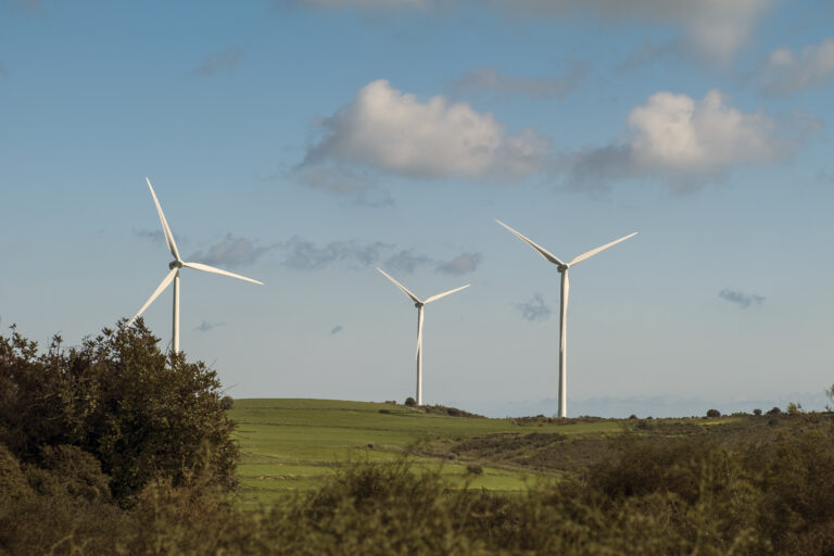 Wind turbines in a wind farm at dusk